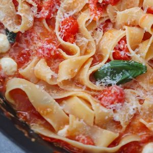 Pasta with cherry tomatoes, cheddar and mozzarella