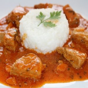 Pork bites with rice and sauce